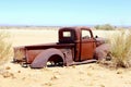 Abandoned rustic pickup car in desert, Africa Royalty Free Stock Photo