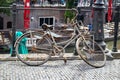 Rusty bicycle. Old bike on a river canal in Utrecht city, Netherlands