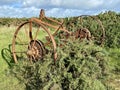 Abandoned rusty farm machinery on Pembrokeshire Coastal Path.