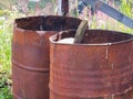 Abandoned rusty fuel and chemical drums. Royalty Free Stock Photo