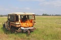 Abandoned landrover car wreck decays fields, Australia