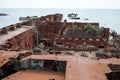 An abandoned rusty warship on the sand of the Baltic Sea. Hel. Royalty Free Stock Photo