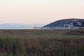 An abandoned salt evaporation pond and a port