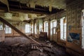Abandoned school interior, dirty room, rotten peeled walls