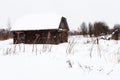 abandoned shed in old russian village in winter