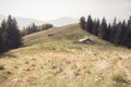 Abandoned sheepfold on the way to Ciucas peak in Carpathian Mountains, Romania Royalty Free Stock Photo