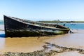 An abandoned ship wreak that is beached up on Orford beach in Suffolk Royalty Free Stock Photo