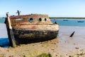 An abandoned ship wreak that is beached up on Orford beach in Suffolk Royalty Free Stock Photo