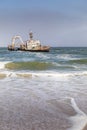Abandoned shipwreck of the stranded Zeila vessel at the Skeleton Coast near Swakopmund in Namibia, Africa, with many cormorants si