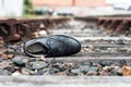Abandoned Shoe On Train Tracks