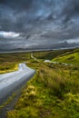 Abandoned Single Track Road Through Scenic Hills On The Isle Of Skye In Scotland