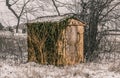 Abandoned small shed or outhouse Royalty Free Stock Photo