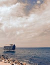 Abandoned stilt home in the sea Royalty Free Stock Photo