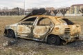 An abandoned, stolen burnt out car Royalty Free Stock Photo