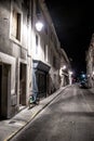 Abandoned Street With Bicycle In The Illuminated City Of Carcassonne In The Night In Occitania, France