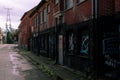 Abandoned street covered with graffiti in Doel, Belgium