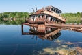 Abandoned sunken Barges Boats On River Pripyat in Chernobyl exclusion Zone. Chernobyl Nuclear Power Plant Zone of Alienation in