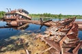 Abandoned sunken Barges Boats On River Pripyat in Chernobyl exclusion Zone. Chernobyl Nuclear Power Plant Zone of Alienation in