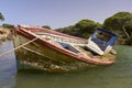 Abandoned and sunken fishing boat on the coast of Cadiz, Spain Royalty Free Stock Photo