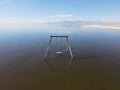 Abandoned Swing In The Water At Bombay Beach, Salton Sea, California