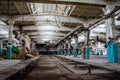 Abandoned tire factory. Industrial hall with remnant of equipment