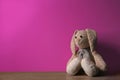 Abandoned toy bunny on table Royalty Free Stock Photo