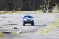 Abandoned toy car on waste and rubbish dump site Royalty Free Stock Photo