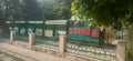 Abandoned Toy Train Kept on Side of Fencing in the Zoo