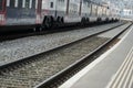 Abandoned train station platform due to corona virus quarantine and home office measures for commuters Royalty Free Stock Photo