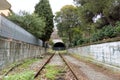 an abandoned train tunnel at the bottom of the tracks Royalty Free Stock Photo