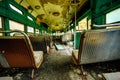 Abandoned Trolley Cars in Fall Inside View