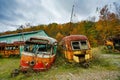 Abandoned Trolley Cars in Fall