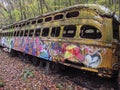 Abandoned trolley cars side view leaning