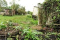 Abandoned truck wreck and train wagon at Quirigua