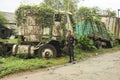 Abandoned truck wreck and train wagon at Quirigua