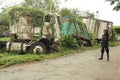 Abandoned truck wreck and train wagon at Quirigua