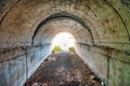 Abandoned tunnel with light at end Royalty Free Stock Photo