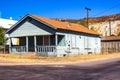 Abandoned Uninhabitable Corner Home With Boarded Up Windows