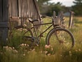 Abandoned Vintage Bicycle by a Rustic Fence Royalty Free Stock Photo