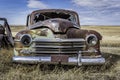 Abandoned vintage green car on the Saskatchewan prairies