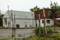 Abandoned warehouse building left to rot in vacant lot