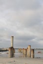 an abandoned wharf building on the beach, makes for a great photo object Royalty Free Stock Photo