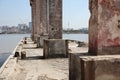 Abandoned wharf buildings by the river Royalty Free Stock Photo