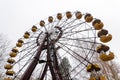 Abandoned wheel of view in pripyat city ghost - town in exclusion radioactiv zone Chernobyl Ukraine. Nuclear dirty place Royalty Free Stock Photo