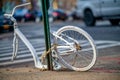 Abandoned white bike in New York City. Bicycle without a wheel l Royalty Free Stock Photo