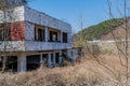 Abandoned white concrete building