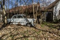 abandoned white ford at farm