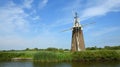 Abandoned Windmill next to the river Ant Norfolk broads Royalty Free Stock Photo