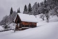 Abandoned wooden hut in snowy mountains Royalty Free Stock Photo