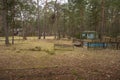 Abandoned wooden mobile homes in a forgotten, abandoned holiday resort on an autumn day. Mess